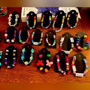 Happiness on a bracelet! Eye catching beads & enlightening words to love!